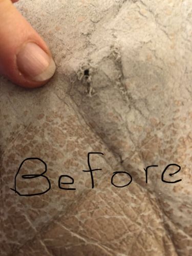 Click to view full screen Picture of small hole and worn leather